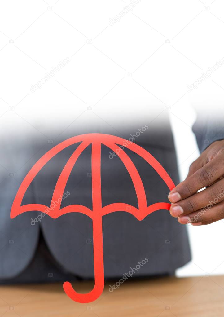 Digital composite of Paper Cut Out umbrella in hand