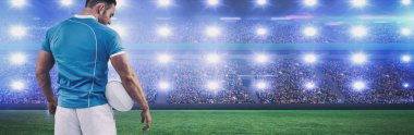 Dijital görüntü kalabalık Futbol stadyum top ile ayakta Rugby oyuncusu