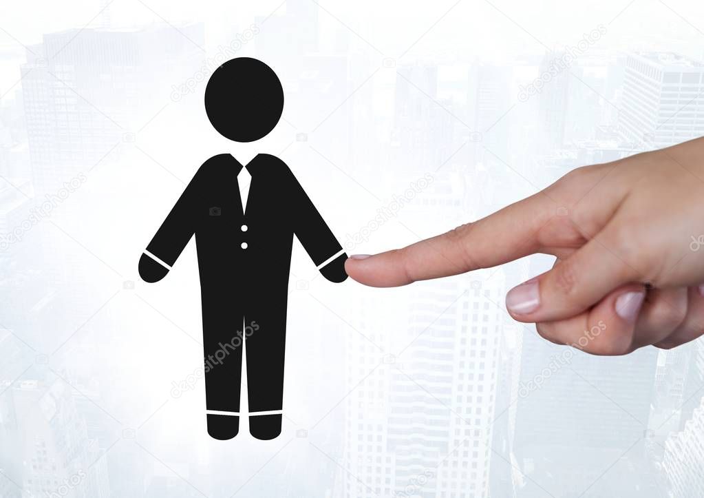 Digital composite of Hand pointing at businessman icon