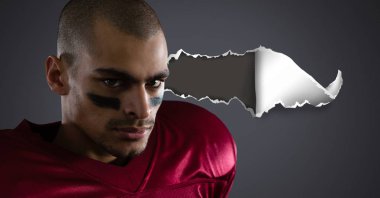 Amerikan futbolu oyuncusu yırtık kağıt ile dijital bileşik