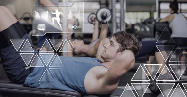 Athletic dijital bileşik adam spor salonunda sağlık arayüzü ile uygun