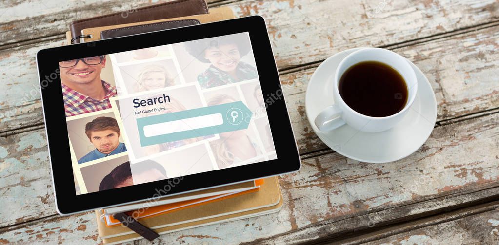 Digital composite image of search engine logo against tablet and coffee