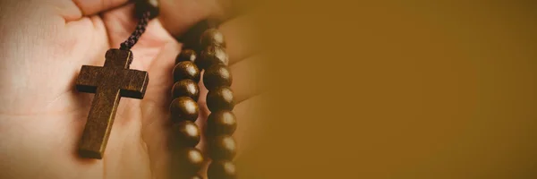 Close Hand Holding Rosary Beads — Stock Photo, Image