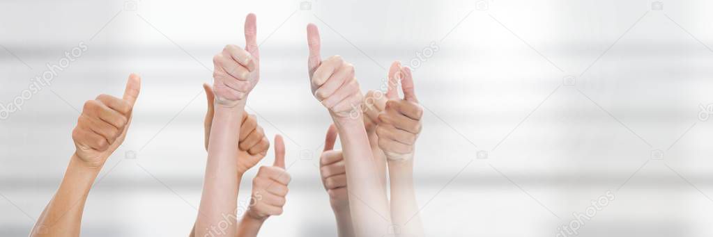 Digital composite of Teamwork transition with thumbs up hands group