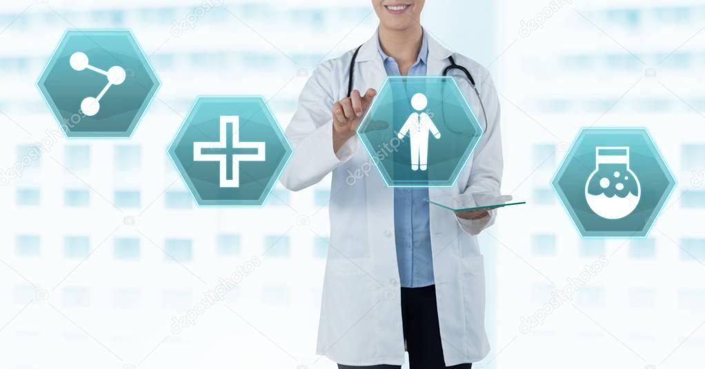 Digital composite of Female doctor holding tablet with medical interface hexagon icons