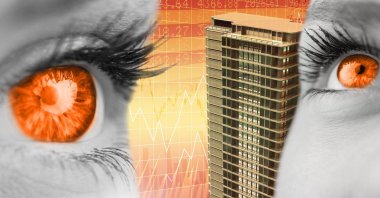 Ekonomik Finans arka plan ile yüksek binalar ve turuncu gözlü dijital bileşik