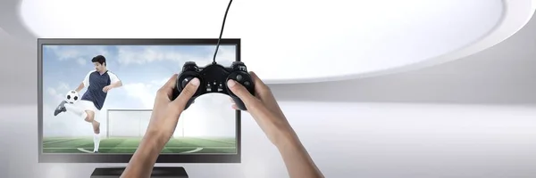 Composto Digital Mãos Segurando Controlador Jogos Com Jogador Futebol Televisão — Fotografia de Stock
