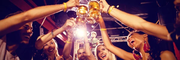 Low Angle View Friends Toasting Beer Glasses While Sitting Table — Stock Photo, Image