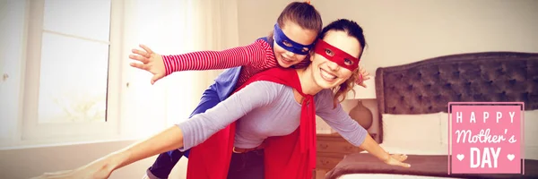 Mães Dia Saudação Contra Mãe Filha Jogando Supermulher — Fotografia de Stock