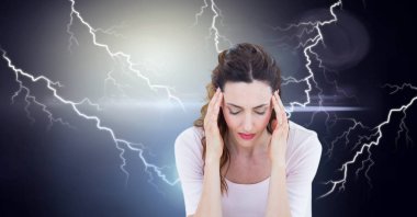 Digital composite of Lightning strikes and stressed woman with headache holding head clipart