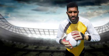 Kaleci futbol stadyumunda tutan dijital bileşik