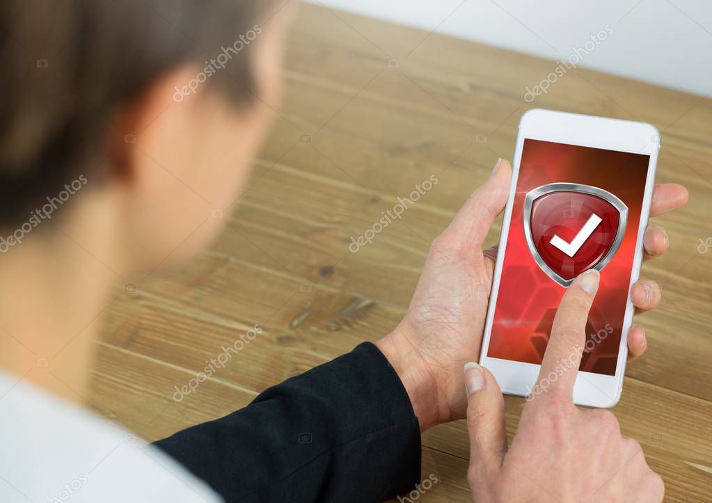 Digital composite of Correct tick protection shield on persons phone