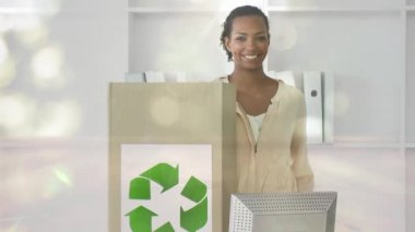 Animation of group of diverse male and female friends recycling paper and putting it into a box with recycling sign with spots of light in the foreground