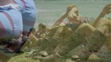 Ragbi oyuncularının arka arkaya ragbi sahasında mekik çekmeleri animasyonu