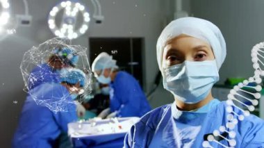 Ameliyathanedeki cerrahlar üzerinde DNA iplikçiklerinin döndürülmesi ve veri işlemesi.