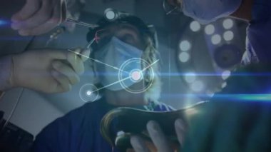 Ameliyathanedeki cerrahlar üzerinden küresel bağlantı ağının animasyonu