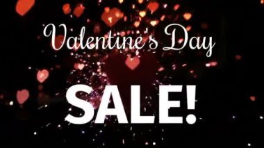 Sevgililer Günü İndirimi kelimelerinin animasyonu! Siyah arka planda uçuşan kırmızı ve pembe kalplerle beyaz harflerle yazılmış.