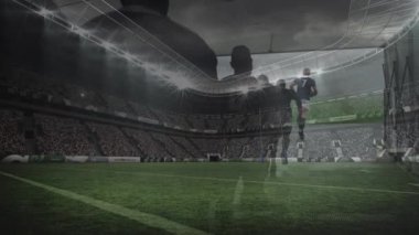Maçın başında bir stadyumda ragbi oyuncularının sahaya koşması animasyonu