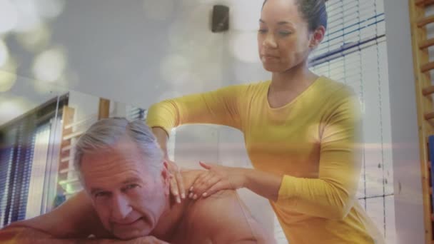 Animation Mature Man Having Massage Done Leaf Moving Foreground — Stock Video