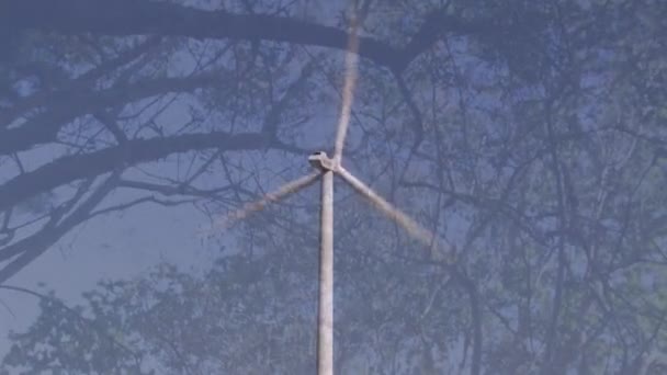 Animáció a forgószél turbina a fák az előtérben