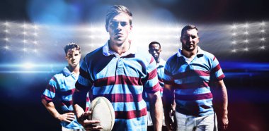 Rugby oyuncuları karşı sahne ışıkları