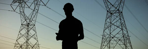 Happy Architect Holding Clip Board Evening Electricity Pylon Silhouette — Stock Photo, Image