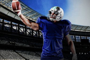 Güneşli bir günde rugby stadyumuna karşı Amerikan Futbolcusu