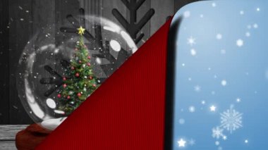 Noel kar küresinin animasyonu. İçinde Noel ağacı, tahtadan tahtalar üzerinde kar taneleri ve kar taneleri ile mavi arka plandan yağan kar.