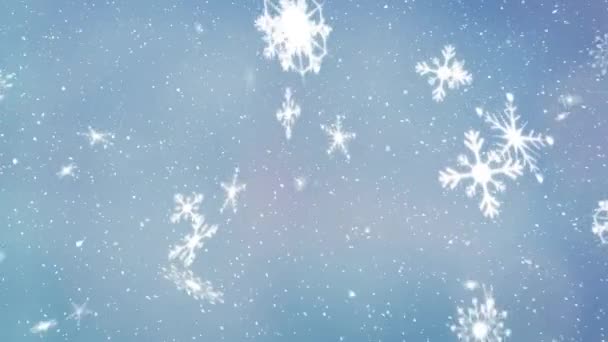 雪の結晶のアニメーションは 光の青の背景に光のスポットとクリスマス時に落ちる — ストック動画