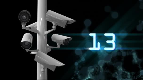 Animation of CCTV cameras moving around and countdown from fifteen to one in blue digital glowing font and moving blue particles on black background — Stock Footage Animation Cctv Cameras Moving Countdown Fifteen One Blue Digital Glowing Stock Footage