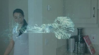 Arka plandaki merkezi ısıtma kontrolünde ısıyı ayarlayan genç bir kadının devre kartında veri işleme animasyonu