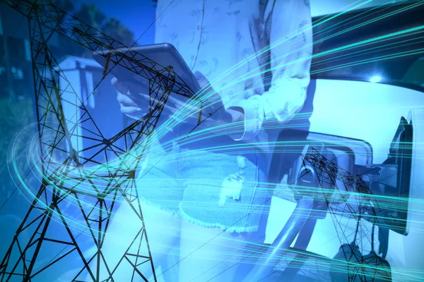 Blue Abstract Design Evening Electricity Pylon Silhouette Woman Using Tablet — Stockfoto