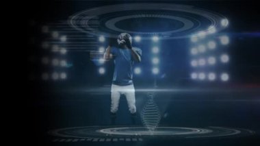 3D DNA ipliği ve veri işleme analizinin animasyonu. Amerikalı bir futbolcunun arka plandaki projektörlerin önünde zıplaması ve futbol topu yakalaması.