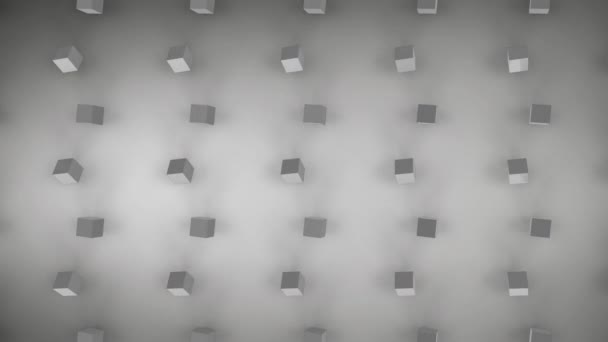 Animation de cubes métalliques gris 3d se déplaçant en formation sur fond gris pâle 