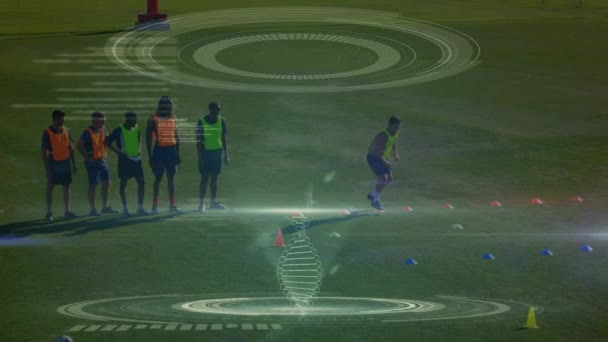 Girando ADN 3D con entrenamiento de equipo de fútbol — Vídeos de Stock