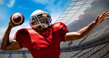 Amerikalı futbolcu bir stadyumun birleşik imajına karşı