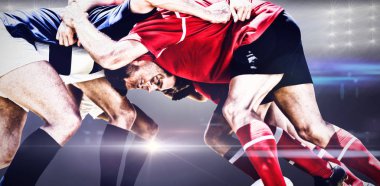 Amerikan Futbolcuları spot ışıklarına karşı