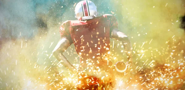 American Football Player Splashing Powder — Stock Photo, Image