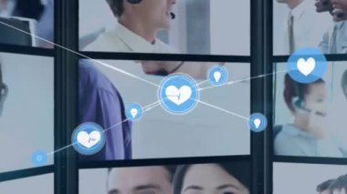 Arka plandaki yoğun bir ofiste ofis çalışanlarını telefon kulaklığı takarken gösteren ekranları olan kalp ve ampul ikonlarıyla bağlantı ağının animasyonu. 