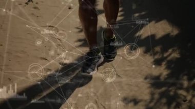 Arka planda koşan erkek atletin bacaklarıyla bağlantı ağı, veri işleme ve istatistik kaydı animasyonu.