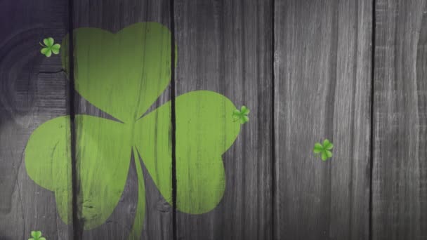 圣帕特里克节多块落下来的浅绿色洗发水石的动画 背景为光斑和绿色三叶草叶 — 图库视频影像