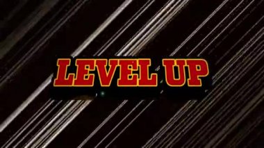 Siyah arkaplanda hızlı hareket eden siyah ve beyaz ışık yollarının üzerine kırmızı harflerle yazılmış Seviye Yukarı kelimelerinin animasyonu. Bilgisayar oyunu ekran ve dijital arayüz kavramı dijital olarak oluşturuldu.