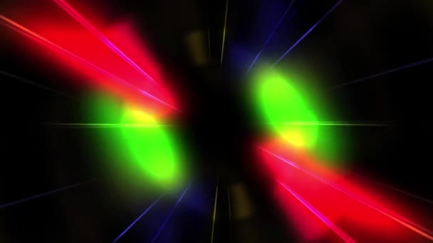 Animation de rayons rouges, orange et verts tournant en boucle sans couture en mouvement hypnotique sur fond noir . 
