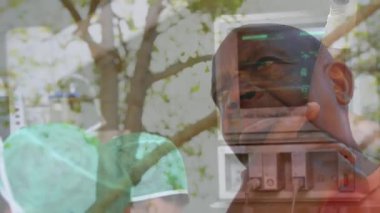 Doktorların koruyucu yüz maskeleri takıp, ameliyat odasında çalışıp, Coronavirus Covid19 'un yayıldığı bir animasyon.. 
