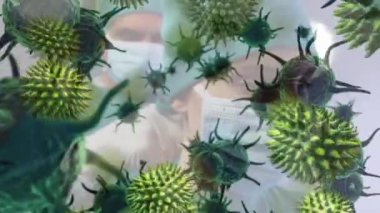 Makro koronavirüs Covid-19 hücrelerinin arka planda yüz maskesi takan erkek ve kadın doktorlara yayılması..