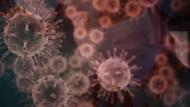 Animacja Makrokoronawirusa Komórki Covid Rozłożone Lekarzy Ubraniach Ochronnych Maskach Twarzy — Wideo stockowe