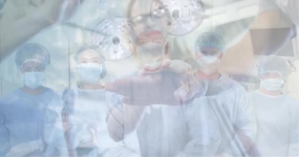 Animacja Grupy Pielęgniarek Lekarzy Noszących Ochronne Maski Twarz Układanie Rąk — Wideo stockowe
