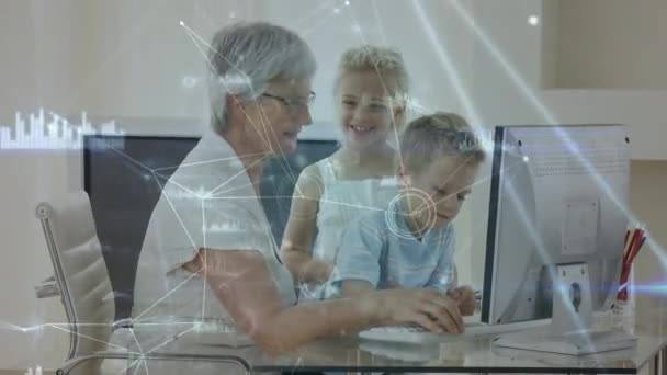 Animation Caucasian Senior Woman Her Two Grandchildren Using Computer Together — Stock Video