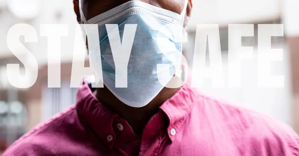 Words Stay Safe Mixed Race Man Wearing Face Mask Public — Stock Photo, Image