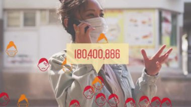 Yüz maskesi takan, telefonla konuşan bir kadının üzerinde yüzen insan simgeleriyle artan bir sayının animasyonu. Dijital olarak üretilen küresel koronavirüs Covid 19 salgın konsepti.